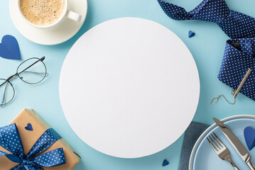 Plan a gorgeous table setting for Father's Day with a top view flat lay of plates, cutlery, coffee, necktie, spectacles, giftbox on a pastel blue background with an empty circle for advertising