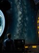 © Fernando - a man is looking at the milky way through a spaceship - Generative AI