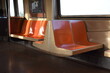 Empty Orange Seats, Riding on the New York Subway Train