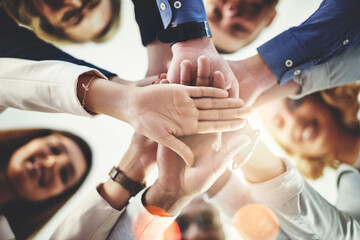 Aufkleber - Team, hands of colleagues together and smile with huddle for collaboration for goal with lens flare. Teamwork or cooperation, businesspeople or coworkers and happy people with hand for support