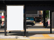 Blank white mock up Media Advertisement at bus stop City street