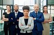 © Diane M/peopleimages.com - Portrait, business people or serious teamwork with arms crossed for diversity, professional commitment or office pride. Group, African woman or global collaboration leadership of corporate employees
