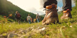 Back view of a group of a tourists hiking in a summer mountains, Generative AI
