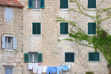 Wall Mural - Traditional old Mediterranean houses built on the rocks in Split, Croatia. 