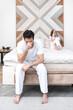 © Vitaliy - Frustrated and depressed man sitting on the edge of the bed after conflict with his wife because of his erectile dysfunction problem
