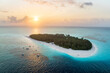 © robertharding - Tropical island washed by the crystal water of the exotic lagoon at sunrise, Mnemba Island, Zanzibar, Tanzania