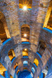 © robertharding - Illuminated view of the bottom of Saint Patrick's well with a spiral staircase, Orvieto, Terni province, Umbria region, Italy