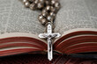 © robertharding - Vintage rosary with crucifix on an open Bible, Christian religious symbol, France