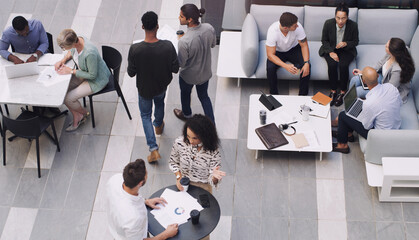 Aufkleber - Top view, group and business people in a meeting, conversation and modern office with development. Staff, coworkers and team at a conference, share ideas and relax on a break, talking and teamwork