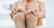 © Alex F/peopleimages.com - Skincare, moisturizer and feet of woman on bed for smooth, pedicure or healthy skin at home. Dermatology, podiatry and closeup of foot of female person for body care, wellness and health in bedroom
