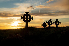 Celtic Cross Gravestone Silhouettes At Cross Abbey Graveyard, Mullet Peninsula, County Mayo, Ireland