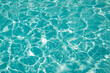 © Milou Dirks - abstract blue swimming pool water background and sun light