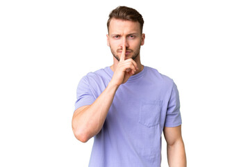 Wall Mural - Young handsome caucasian man over isolated chroma key background showing a sign of silence gesture putting finger in mouth