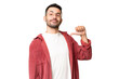 © luismolinero - Young handsome caucasian man over isolated chroma key background proud and self-satisfied