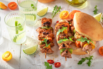 Wall Mural - Fresh roasted shashlik with bun as healthy snack for bbq.