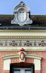 Wall Mural - detail of a glazed tile panel on a facade of a house in Saint Valery sur Somme in France