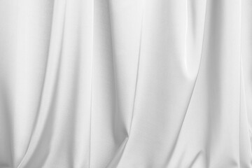 White silk fabric as background, closeup view