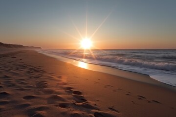 Canvas Print - beautiful sunset on the beach with visible footprints in the sand Generative AI