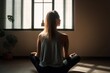 © Angus.YW - Young woman meditating in lotus position on the floor at home, generative Ai
