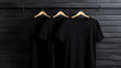 Blank black t-shirts set hanging on hanger’s mockup dark black background generative ai