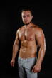 © vladorlov - Young handsome guy on a diet. A man with a beautiful athletic body.
