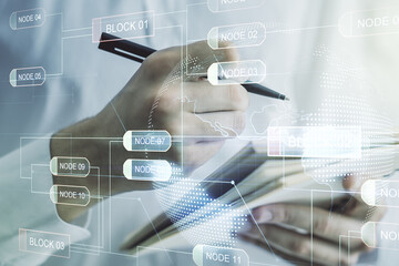 Wall Mural - multi exposure of abstract software development hologram with world map and man hand writing in note