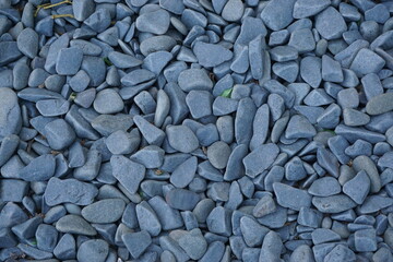 stone wall background, small naturally polished green or blue rock pebbles background, stones, spa, texture