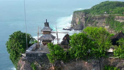 Wall Mural - Aerial shot of Uluwatu temple. Uluwatu Temple is a Balinese Hindu sea temple located in Uluwatu.