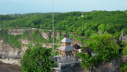Wall Mural - Aerial shot of Uluwatu temple. Uluwatu Temple is a Balinese Hindu sea temple located in Uluwatu.