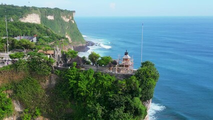 Wall Mural - Aerial shot of Uluwatu temple. Uluwatu Temple is a Balinese Hindu sea temple located in Uluwatu.