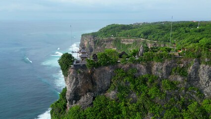 Wall Mural - Aerial shot of Uluwatu temple. Uluwatu Temple is a Balinese Hindu sea temple located in Uluwatu.