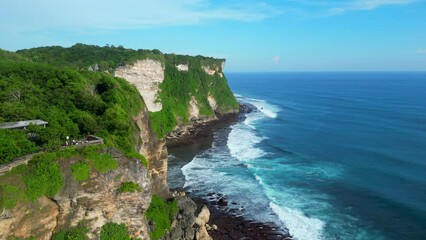 Wall Mural - Aerial shot of Uluwatu temple. Uluwatu Temple is a Balinese Hindu sea temple located in Uluwatu.