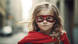 Portrait of a girl in a superhero costume. 