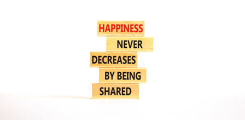 Wall Mural - Happiness symbol. Concept words Happiness never decreases by being shared on wooden block. Beautiful white table white background. Motivational Happiness concept. Copy space.