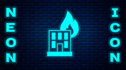 Sticker - Glowing neon Fire in burning building on city street icon isolated on brick wall background. Destroyed city on fire. Vector