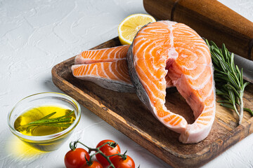 Wall Mural - Fesh raw salmon fillet with herbs, over white background