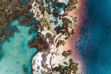 Wall Mural - Aerial view of the many different vibrant colours in the ocean. Boundary Island, Mandurah, Western Australia seascape coastline.