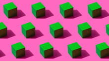 3D Pattern Of Green Cubes Against Pink Background