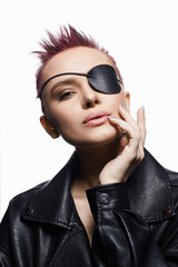 beautiful woman with pirate eye patch and short pink hair