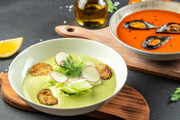 Canvas Print - Assortment vegetable soups, tomato soup with mussels and zucchini. Food recipe background. Close up