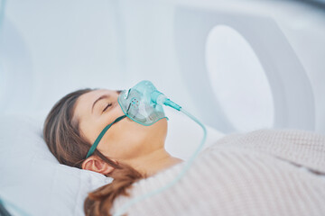 picture of brunette woman in oxygen cabin