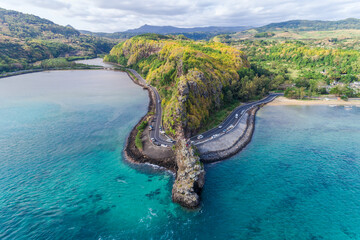 Wall Mural - Beautiful aerial view of Maconde Point in Mauritius. Highway wrapping around the coastline.