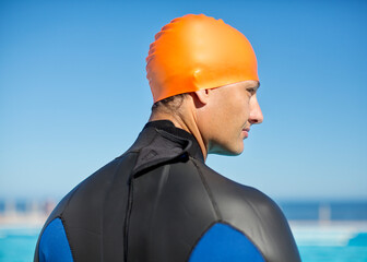 Canvas Print - Triathlete wearing wetsuit and cap