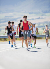 Canvas Print - Runners in race on rural road