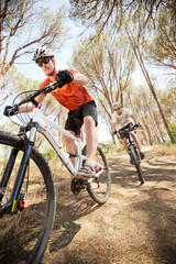 Canvas Print - mountain bikers on dirt path