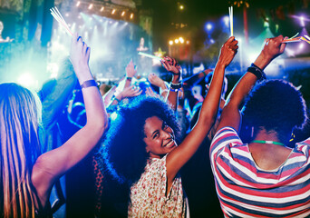 Wall Mural - Portrait of cheering woman at music festival