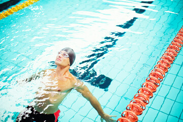 Swimmer on back in pool