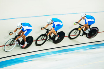 Wall Mural - Track cycling team racing in velodrome