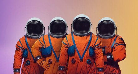 Wall Mural - astronauts in space suit on color background. space crew of artemis mission on moon. elements of thi