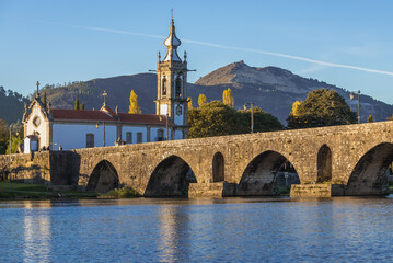 Sticker - Church of Santo Antonio da Torre Velha and Roman bridge in Ponte de Lima town in historical Minho Province, Portugal